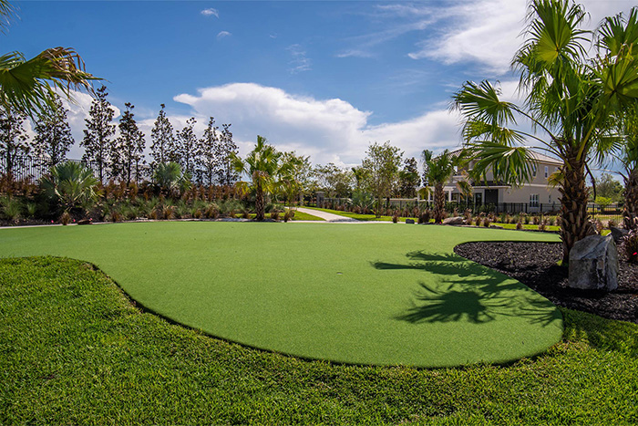 Putting green practice area at The Bear’s Den Resort Orlando’s Golden Bear Park.