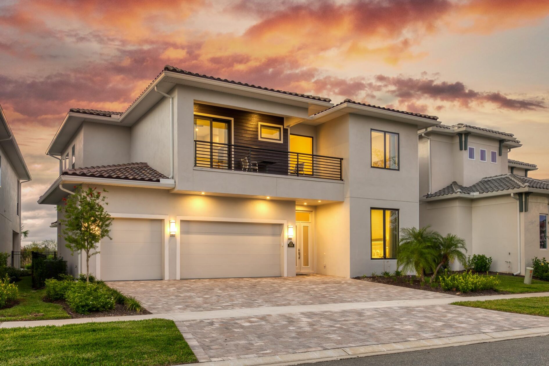 Front of an 8-bedroom Bear’s Den home with private driveway and garage.