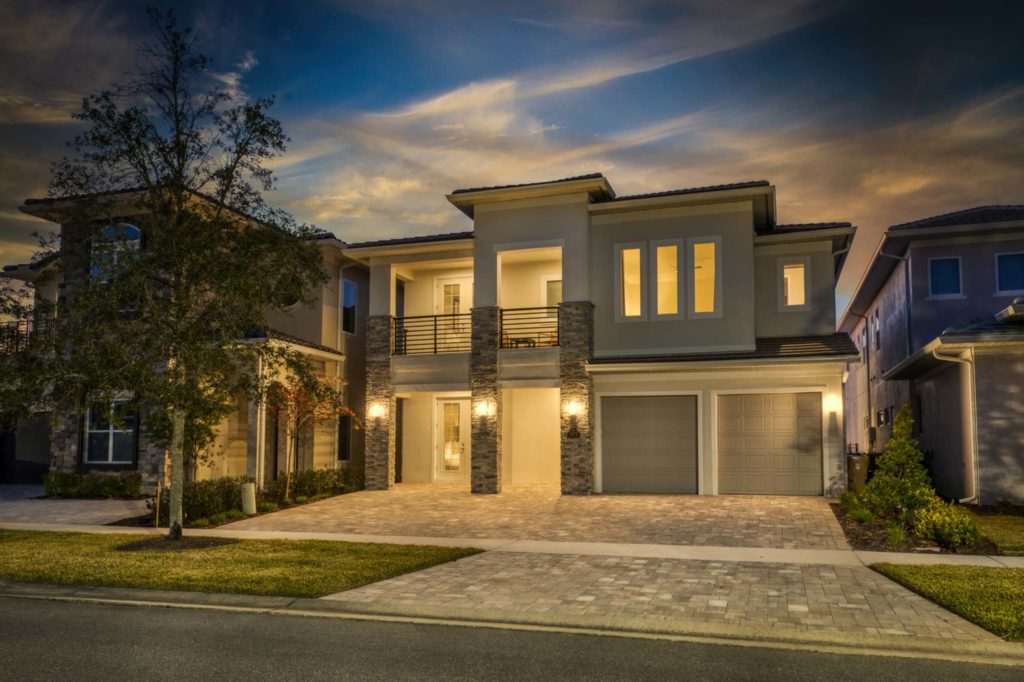 Front of a stunning 5-bedroom Bear’s Den Resort Orlando residence at sunset.
