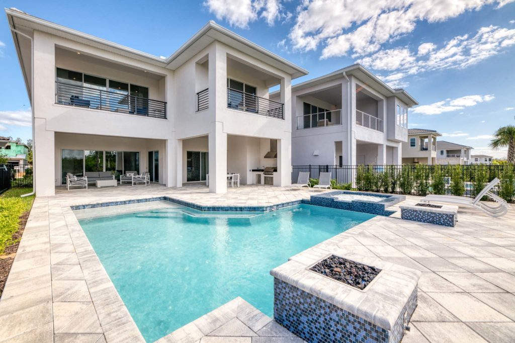 Private backyard patio with pool, spa, and fire pits.