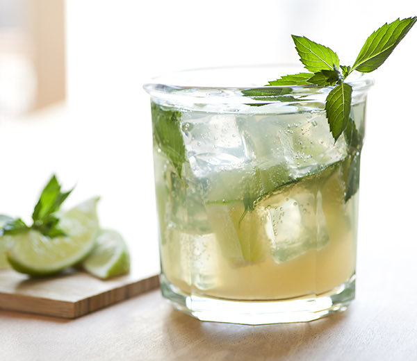Cocktail garnished with a mint leaf.