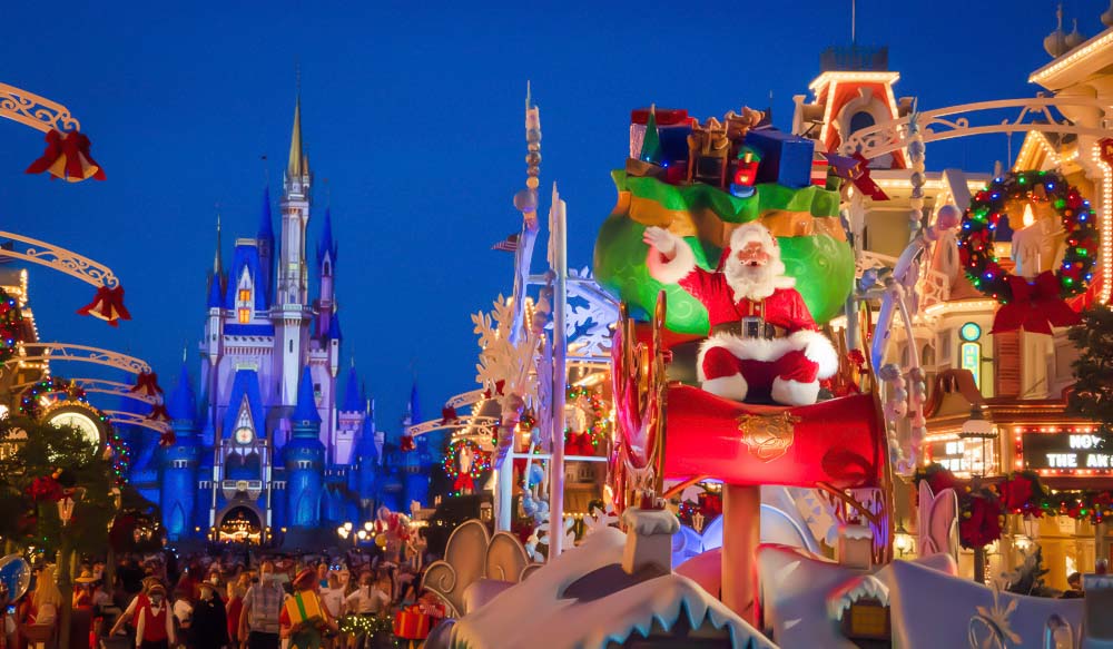 Walt Disney World Christmas parade featuring Santa Claus.