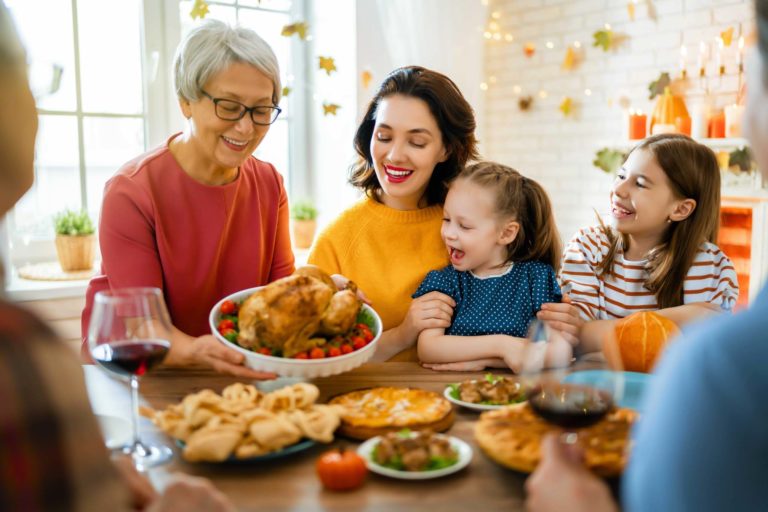 Happy family having Thanksgiving together.