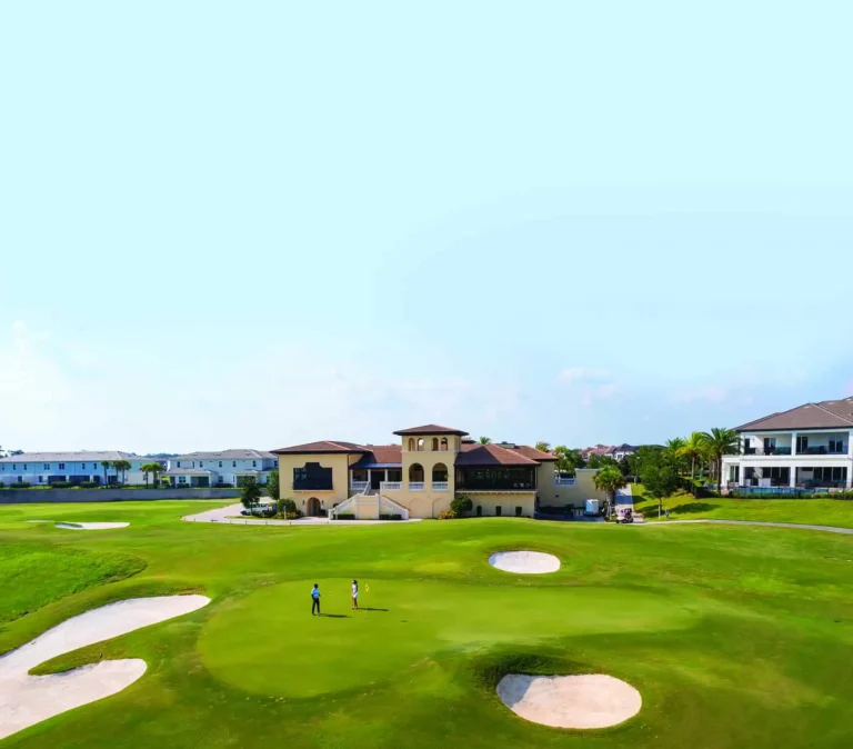 Aerial view of people on the putting green of the Jack Nicklaus Signature Golf Course at The Bear’s Den Resort Orlando