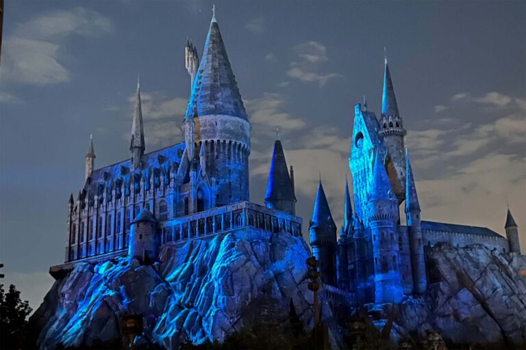 Universal Studios Hogwarts castle lit up at night