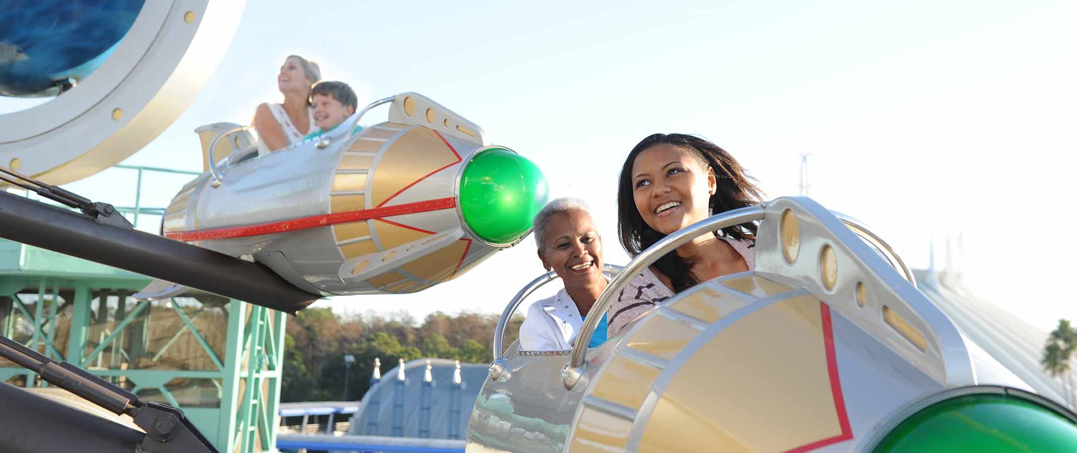 Mother and daughter riding the Astro Orbiter at Disney's Magic Kingdom
