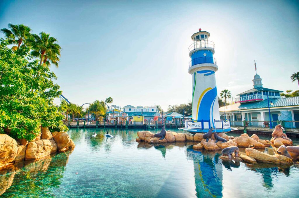 SeaWorld Orlando lighthouse surrounded by lagoon
